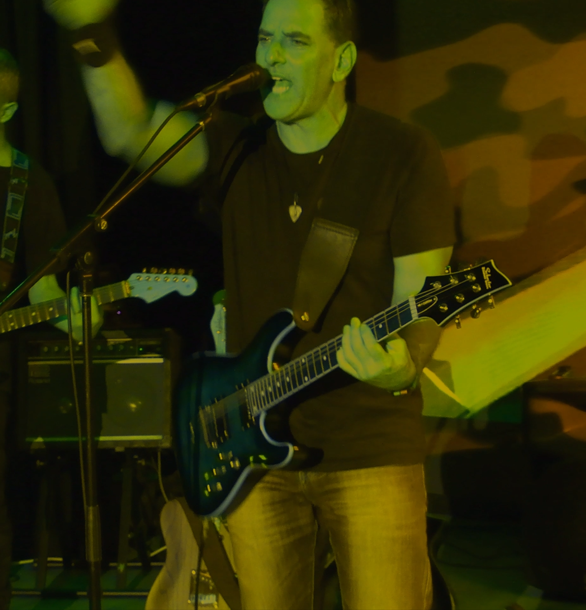 Neville Kaye — Lead vocals and guitar