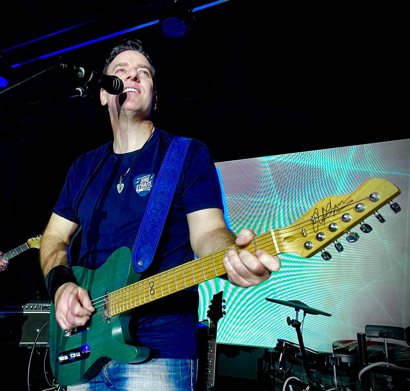 Neville Kaye performing live