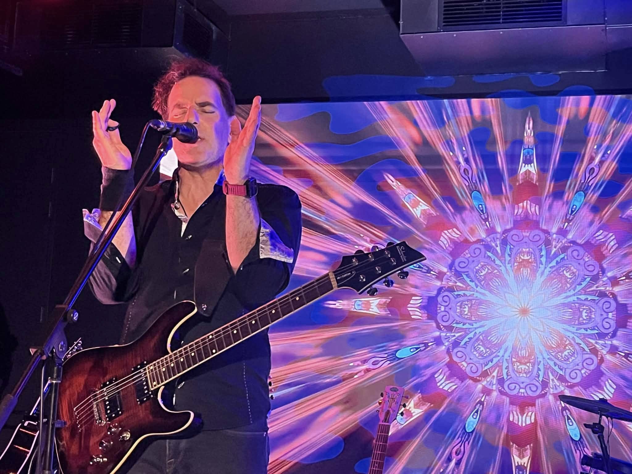 Neville Kaye — lead vocals and guitar